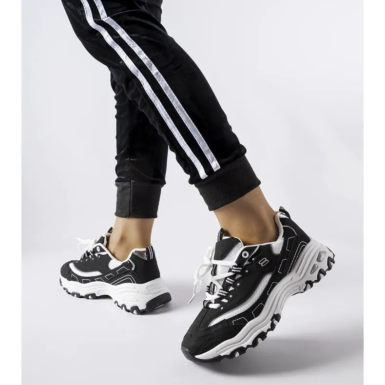 Baskets de sport Kouri noires et blanches le noir